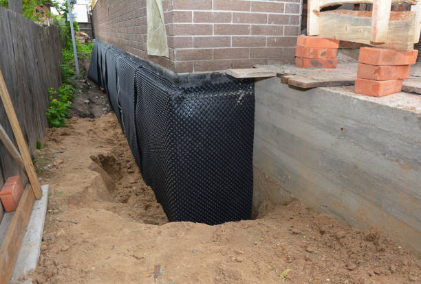 SJ Waterproofing Pros technician performing targeted Emergency Waterproofing assessment in West Chester, PA